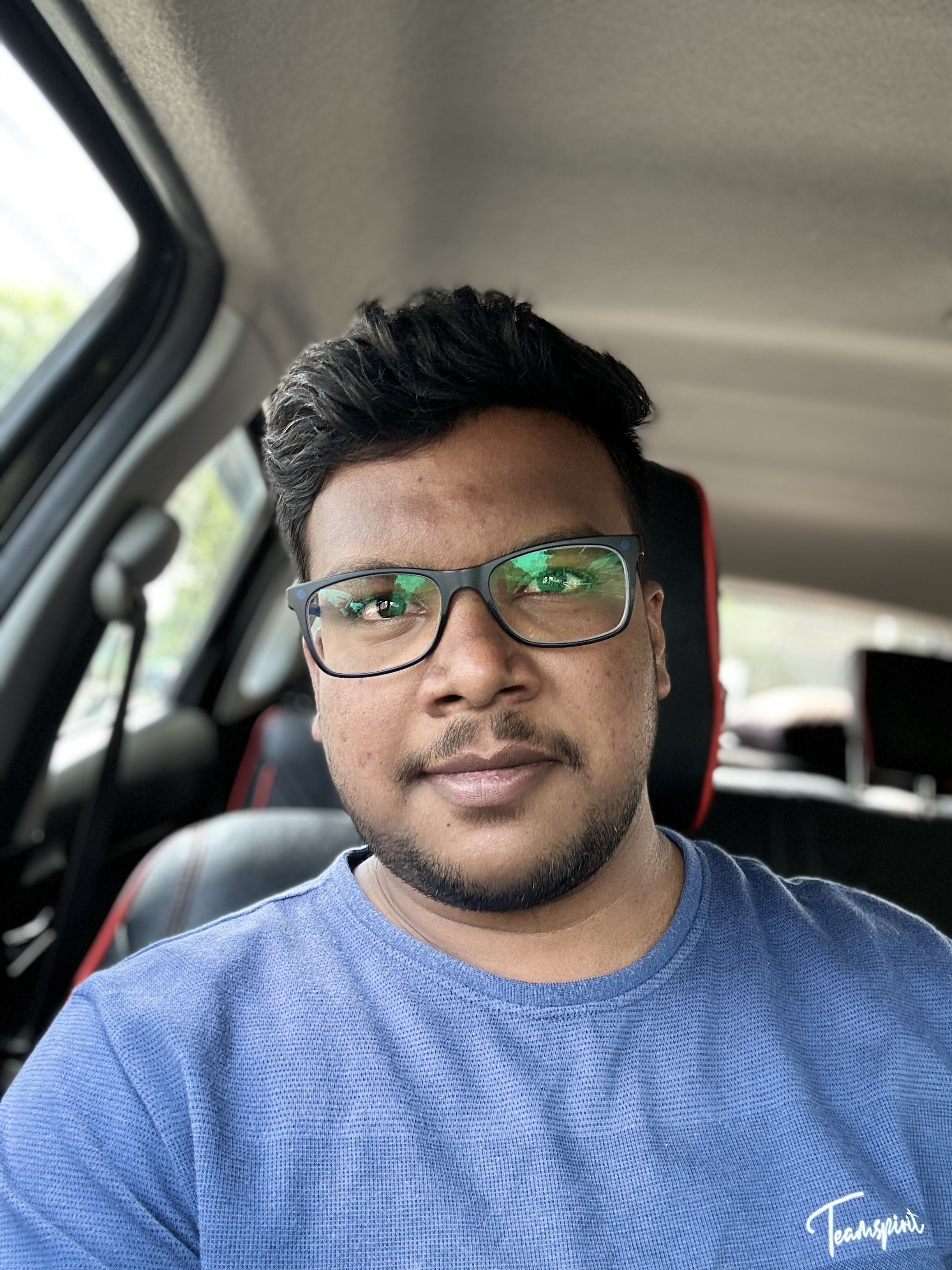 Shabul Hussain casual selfie in car with glasses