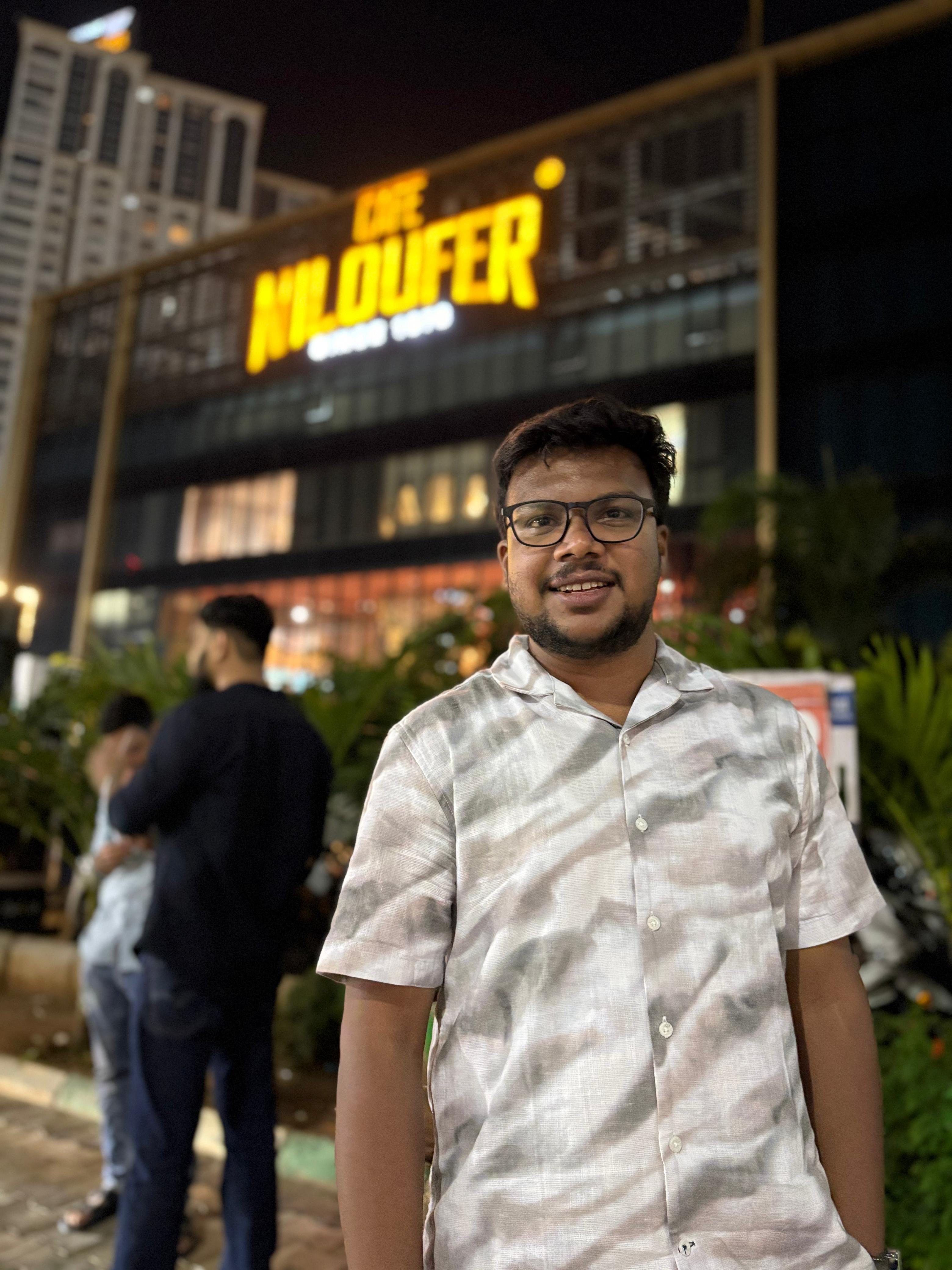 Shabul Hussain outside Cafe Niloufer Hyderabad at night
